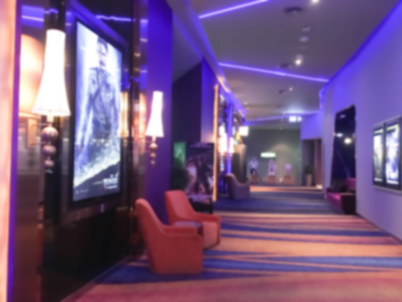 Projector screen viewing setup for a theatre-style venue